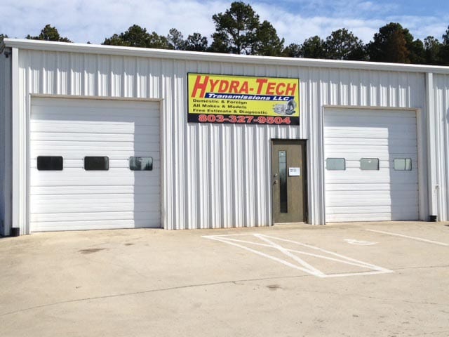 Hydra-Tech Transmissions - exterior shot of Hydra-Tech metal building painted white with sign on the front